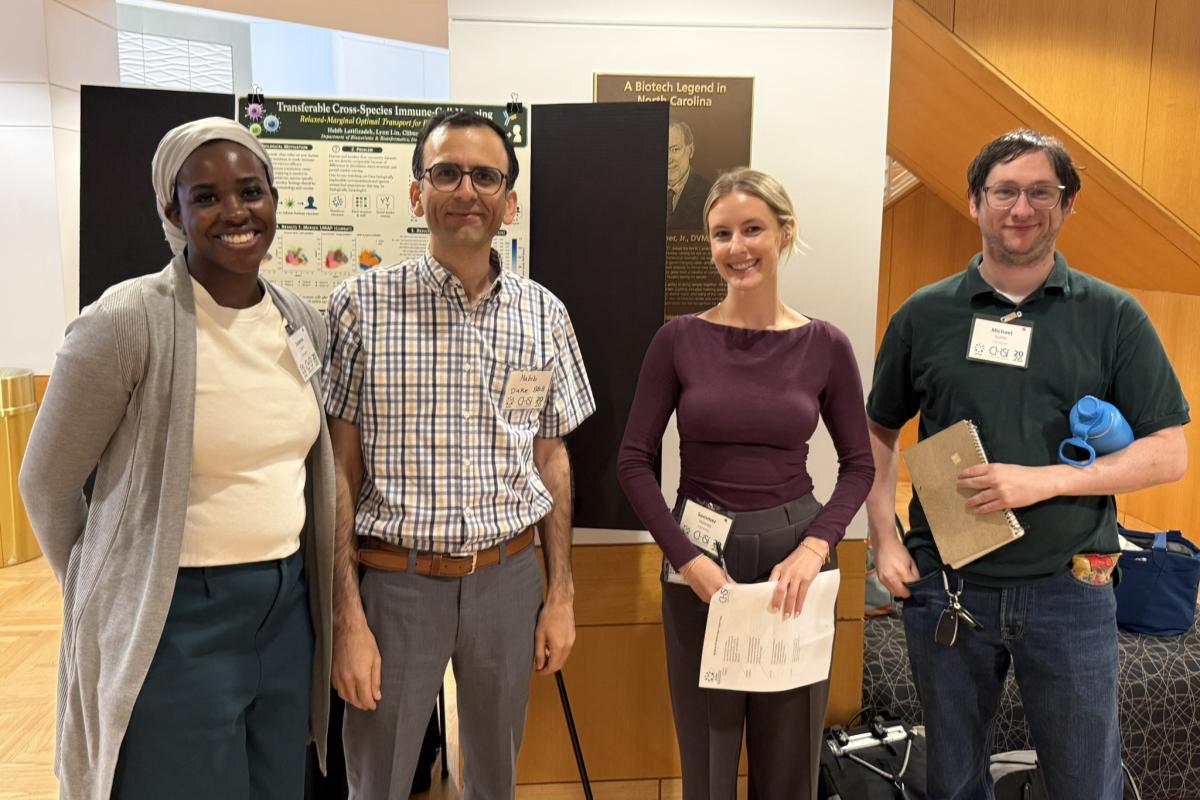 Presenter, Habib Latifizadeh with attendees, Savanna Toure, Sommer Holmes and Michael Spiller.