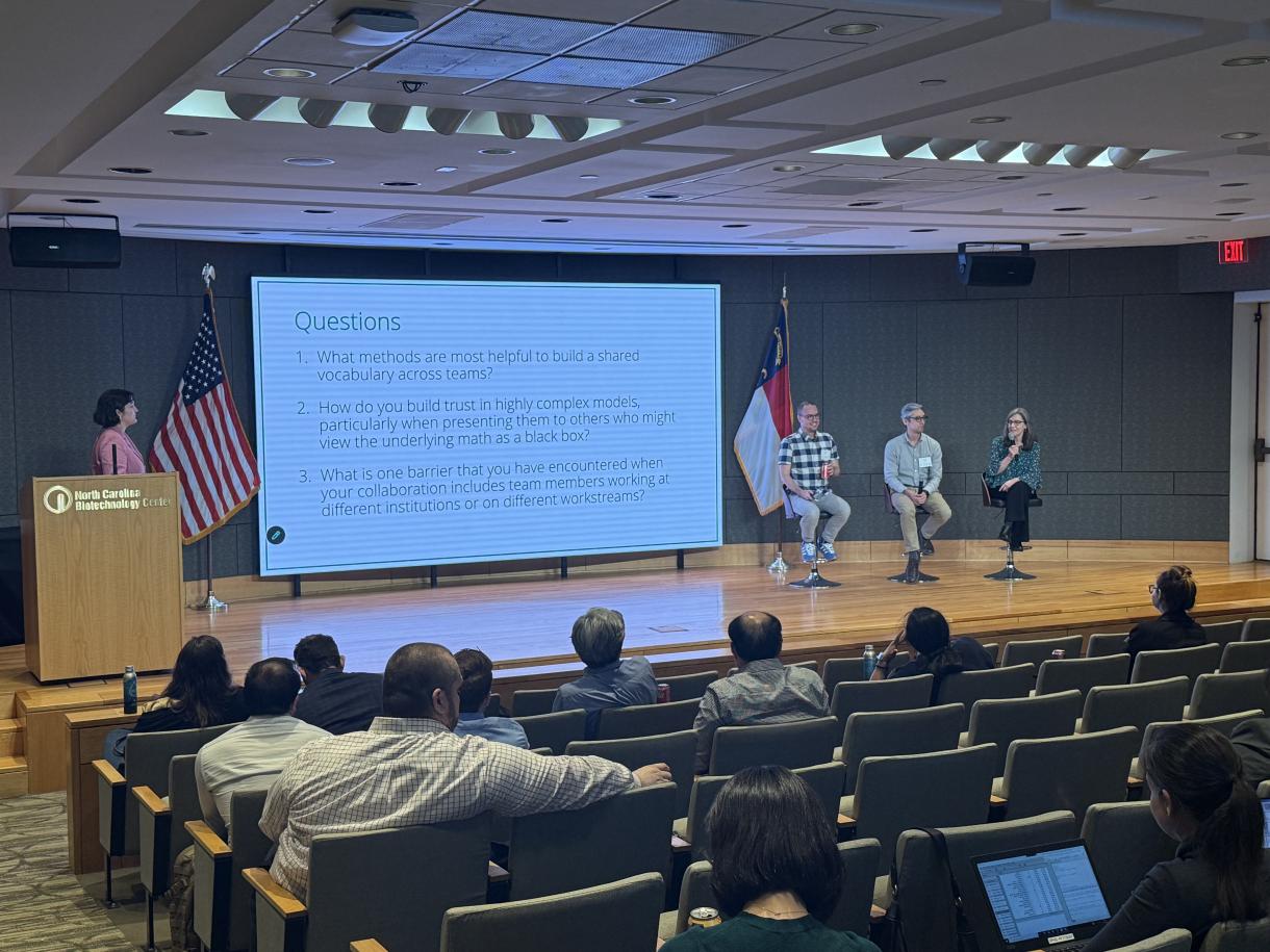 Team Science panel session, moderated by Melanie Sadecki (far left), and featuring panelists Bruce Rogers, Ph.D., Kevin Flores, Ph.D., and Georgia Tomaras, Ph.D